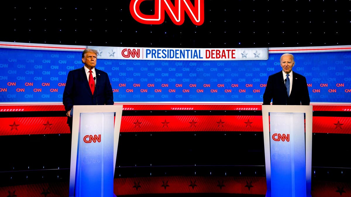 Trump and Biden astatine  the debate