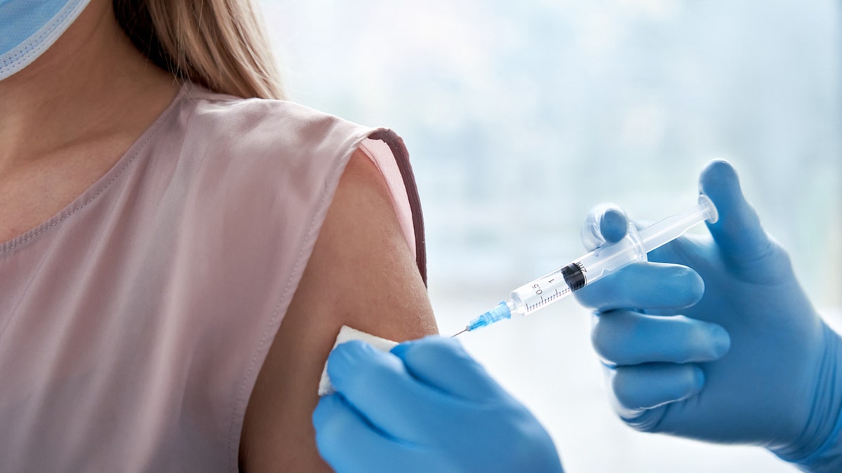 Woman gets vaccine