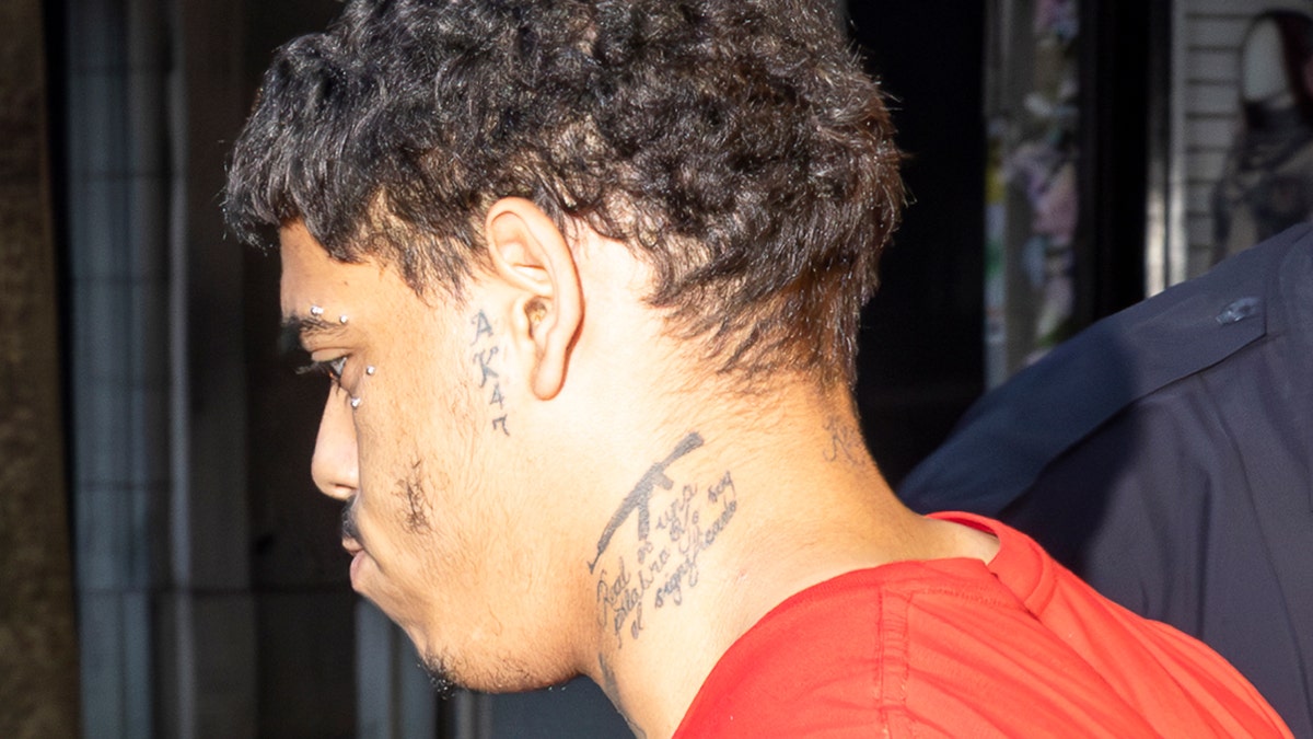 NYPD off-duty carjacking perp tattoos