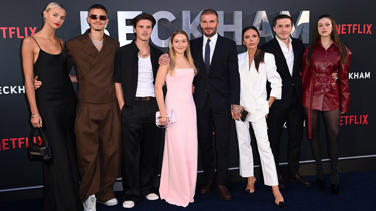 David Beckham stands with his family at the premiere of his Netflix documentary