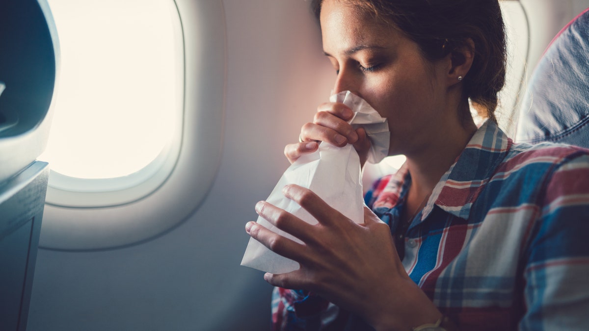 Woman sick on plane