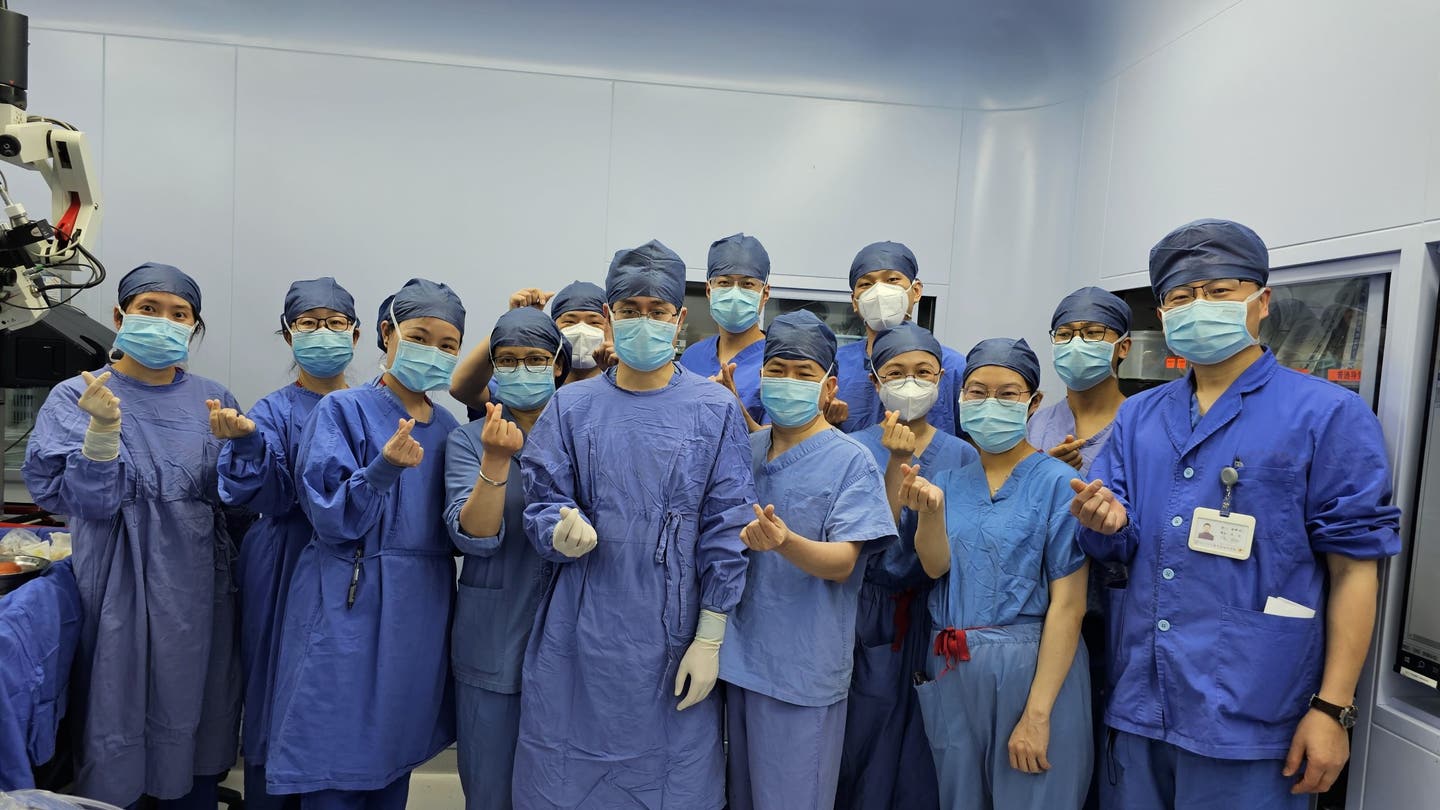 Dr. Yilai Shu in the OR at theEye ENT Hospital of Fudan University middle scaled