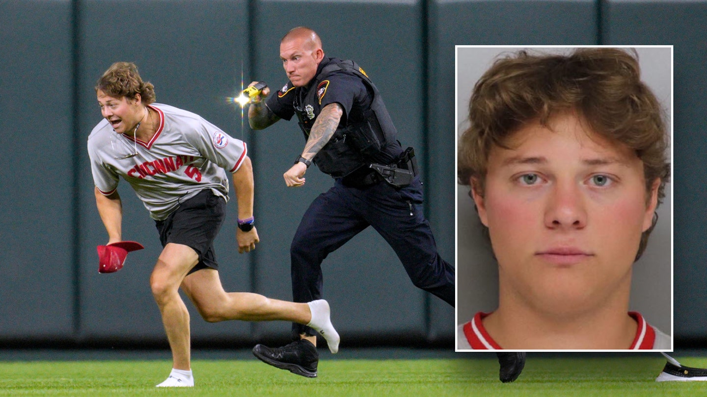 Reckless Thrill-Seeker: Reds Fan Tasered After Daring Field Invasion and Backflip