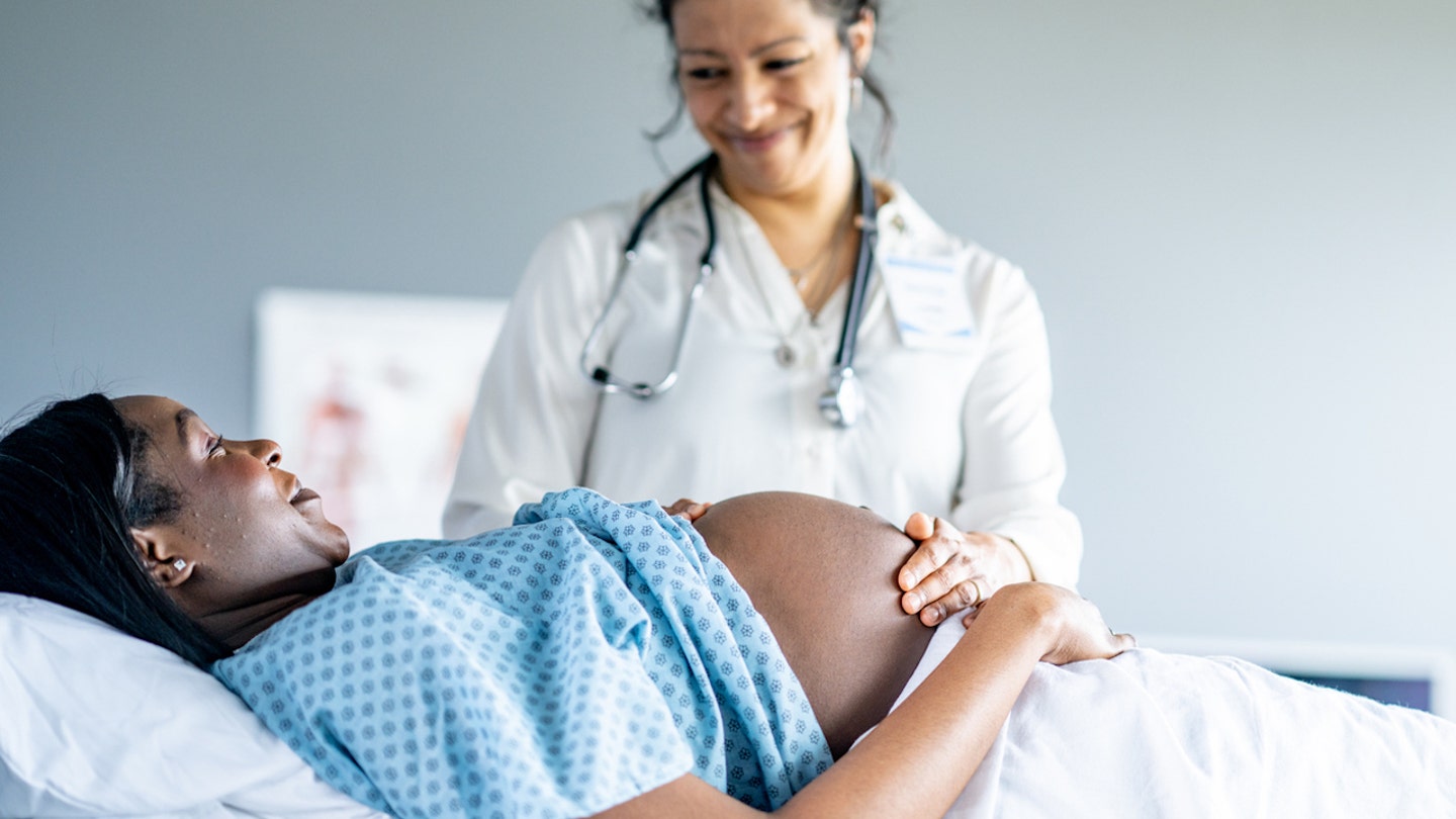 woman in labor with doctor