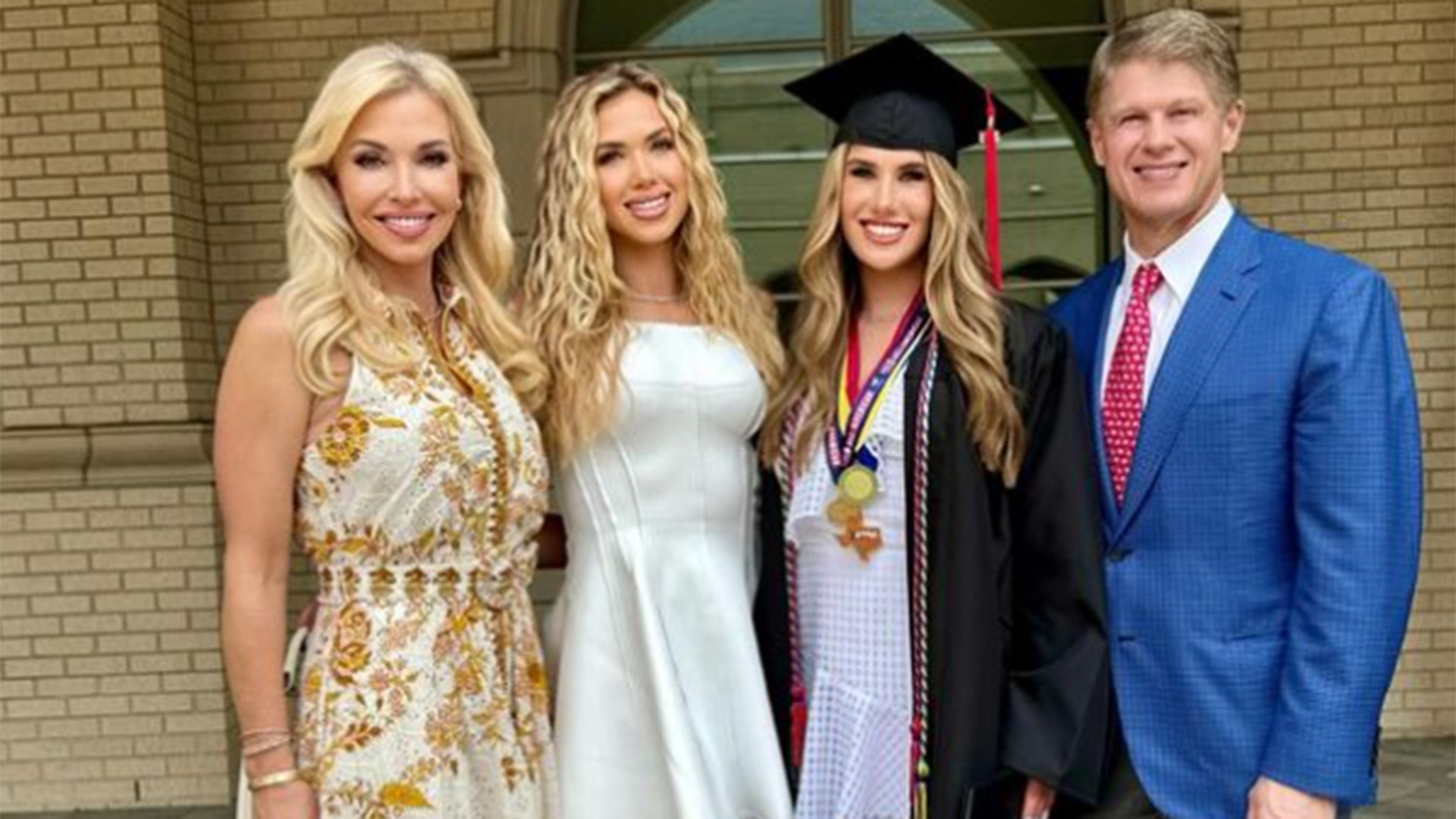 Ava Hunt and her parents at her graduation