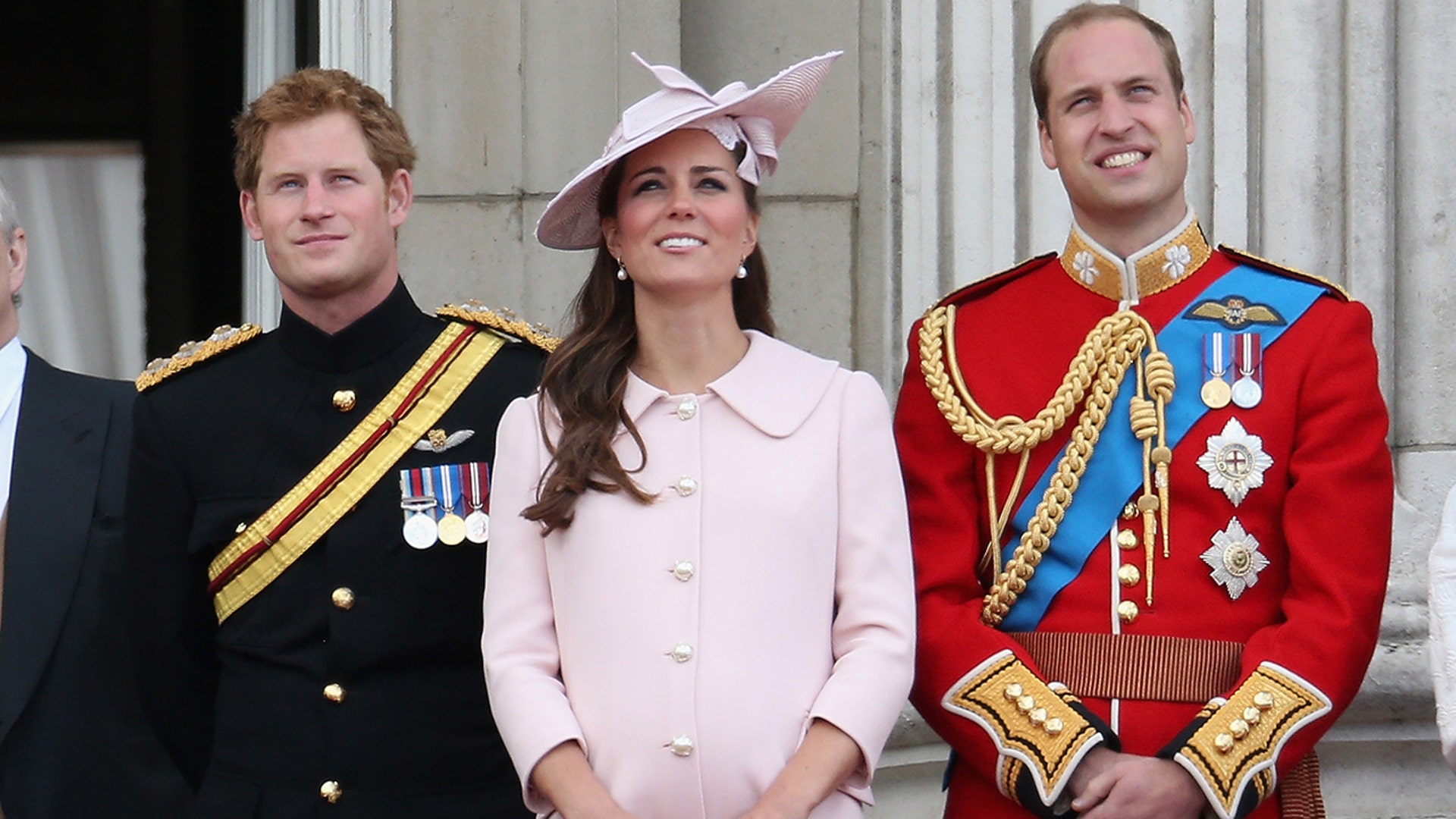 Middleton joined Prince Harry, Prince William and the rest of the royal family on the Buckingham Palace balcony, showing off her baby bump under a pink dress.