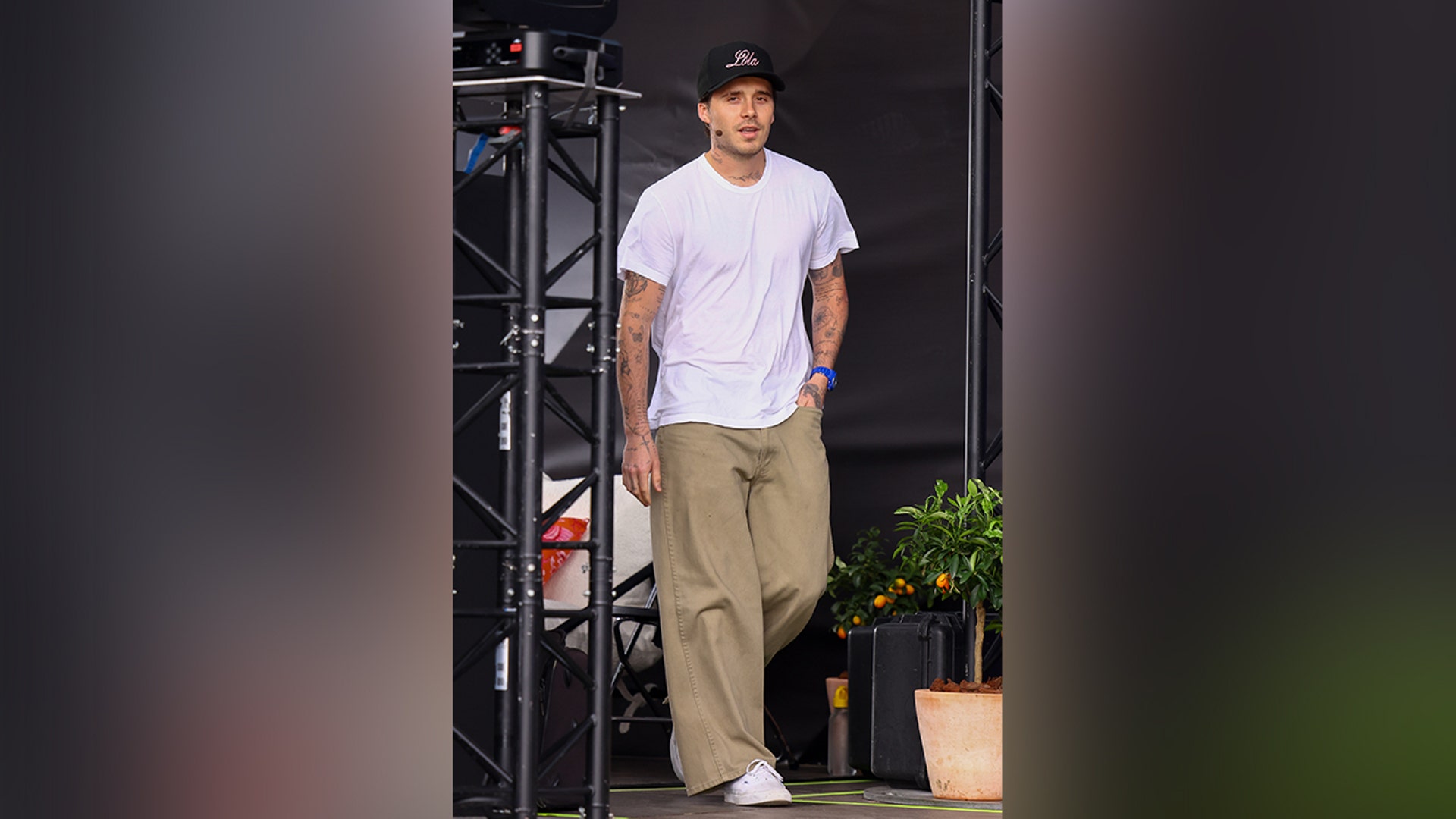 Brooklyn Beckham kept it casual in khaki pants and a white shirt while hosting the "Live eats with Brooklyn Peltz Beckham," as part of the Cannes Lions International Festival Of Creativity 2024.