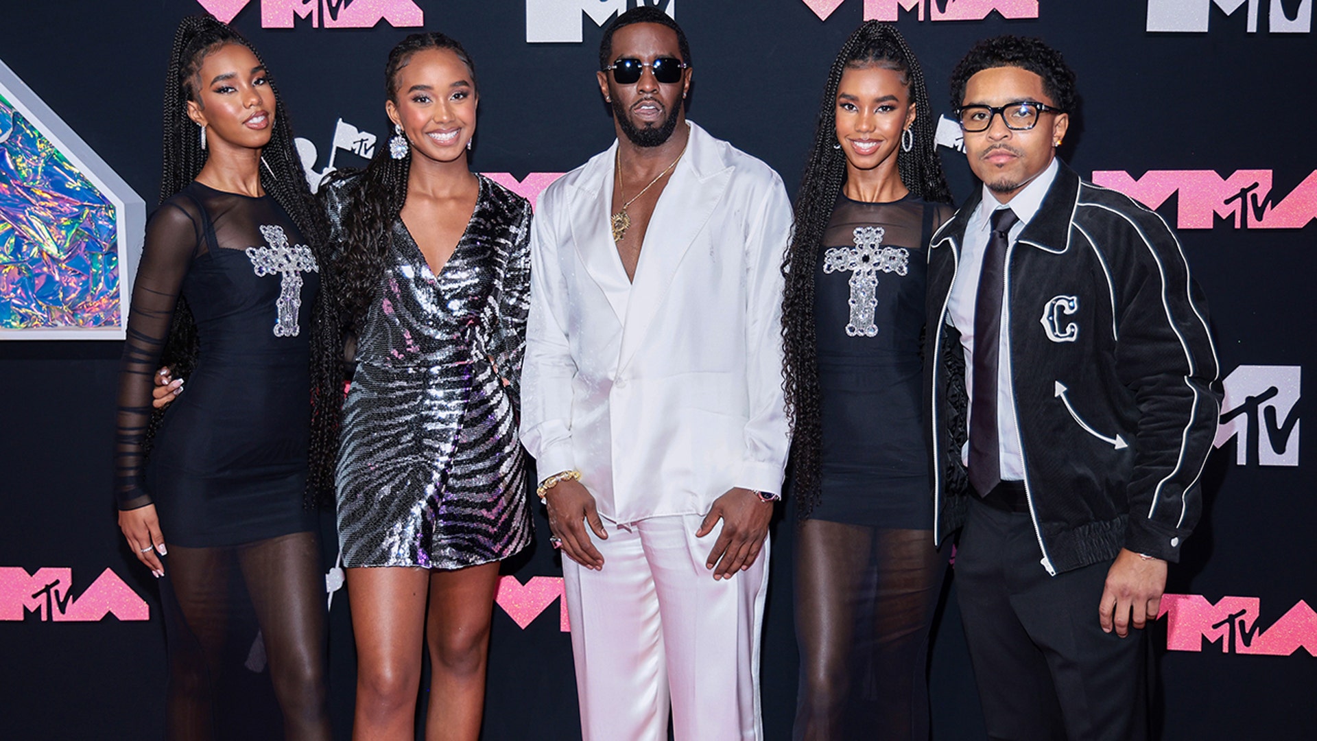 Chance Combs with Sean Combs and her siblings at the MTv VMAs in 2023.