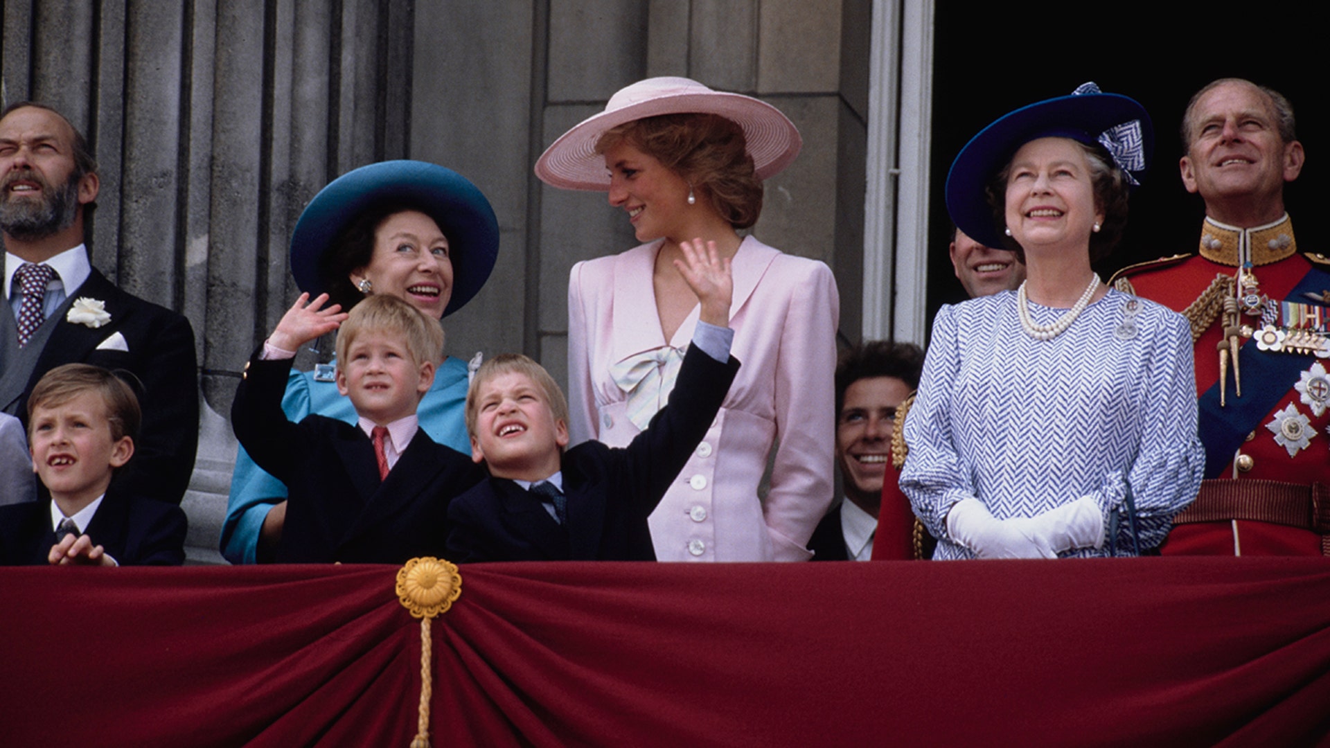 Diana looked pretty in pink as Prince Harry and Prince William happily waved to the crowd on the trooping balcony.
