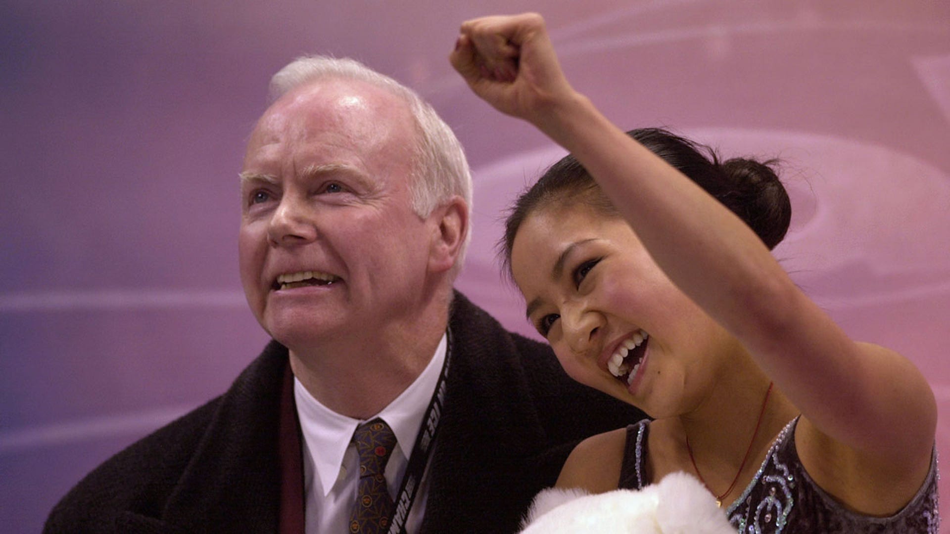 Michelle Kwan and Frank Carroll celebrate