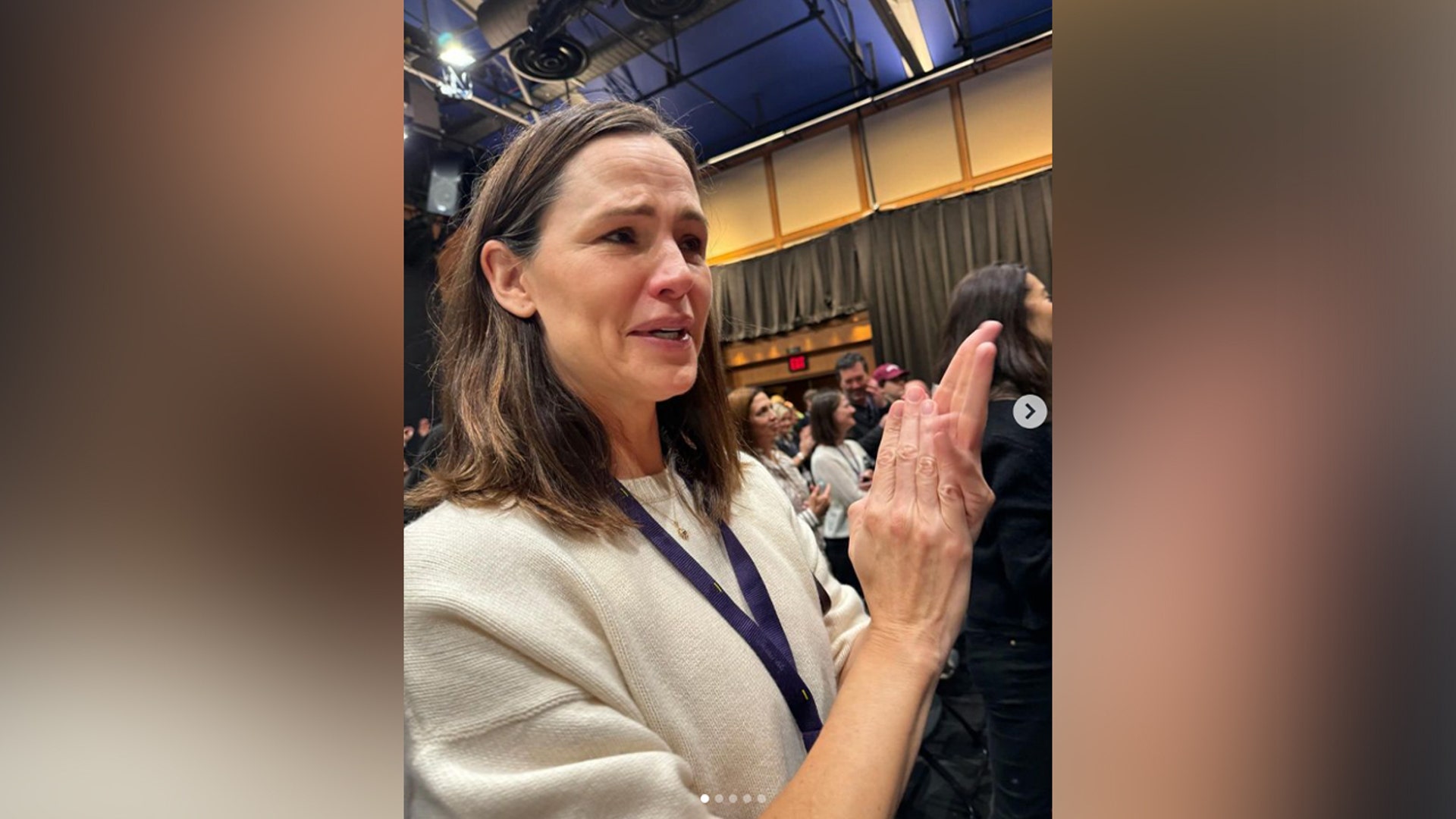 Jennifer Garner tearing up at her daughter's graduation ceremony.
