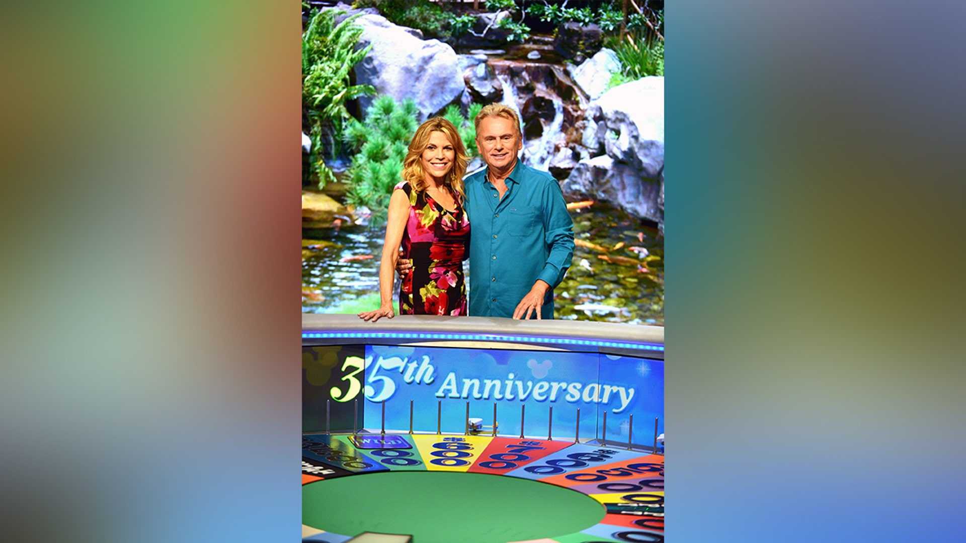 Pat Sajak and Vanna White filming in EPCOT