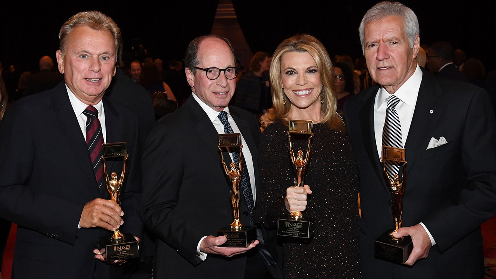Pat Sajak and Vanna White at an award show