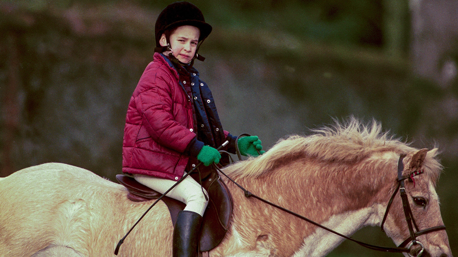 Prince William practiced horse riding near Sandringham Estate in January 1990.