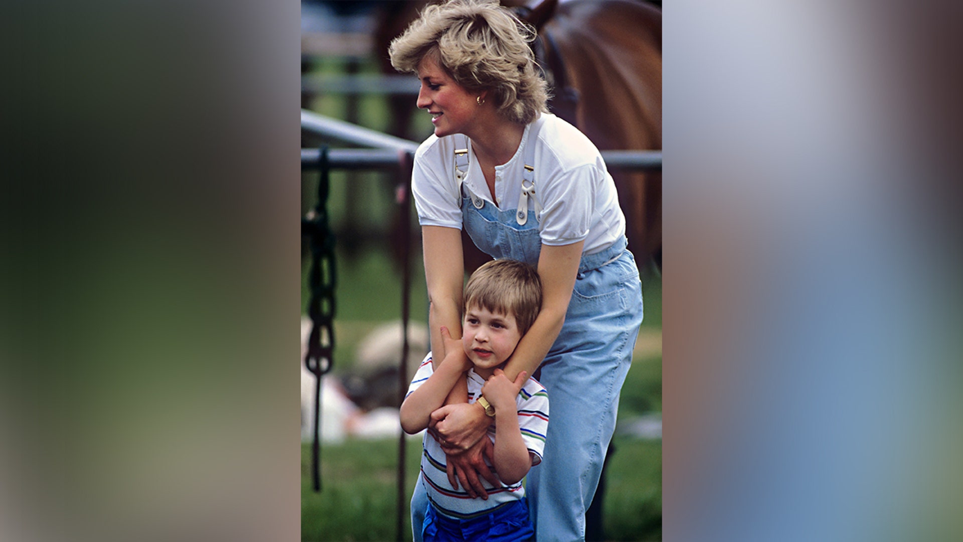 Prince William and Princess Diana cuddled while watching a polo match.