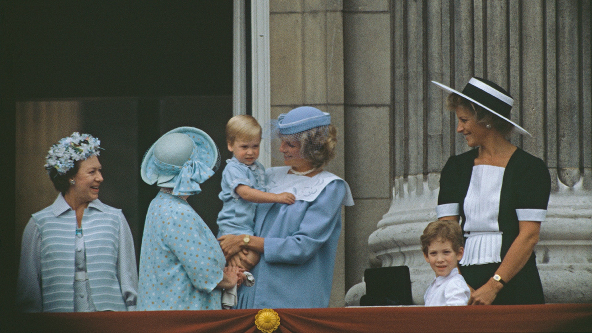 At almost one-years-old, Prince William made his debut at the Trooping of the Colour balcony in 1984.