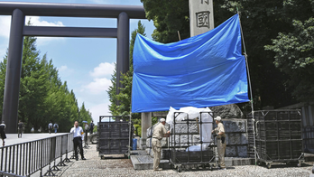 Police hunt for suspects after war shrine is defaced with graffiti in Tokyo