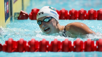 Olympic great Katie Ledecky swims around Lia Thomas, NCAA lawsuit question
