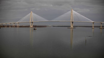 Out-of-control ship speeding through harbor forces major South Carolina bridge closure