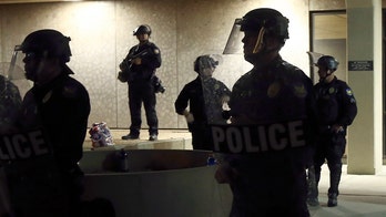 Justice Department finds Phoenix Police have used excessive force, discriminated against minorities
