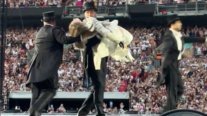 Travis Kelce joins Taylor Swift on stage during 'Eras Tour' in London
