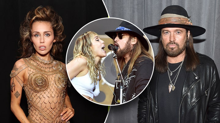 Miley Cyrus walks the red carpet at the Grammys in gold