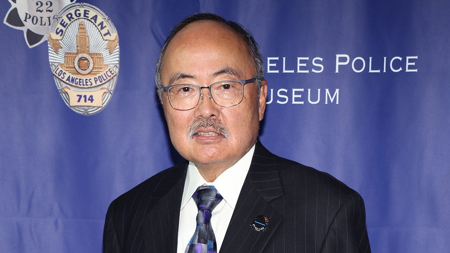 Judge Lance Ito wears suit and tie to LAPD museum opening.