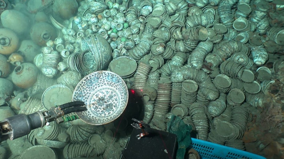 Treasure trove dating back centuries pulled from shipwreck 5,000 feet underwater