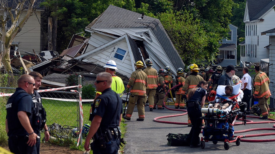 13 injured following Syracuse house collapse due to possible gas explosion