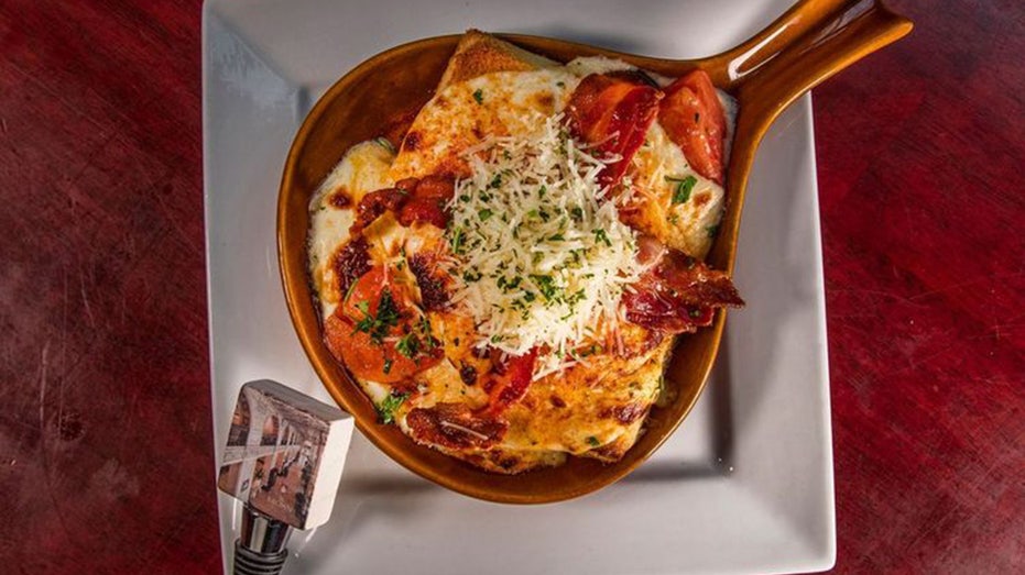 Hot Brown is Kentucky's meaty, cheesy, signature sandwich that you don't eat with your hands