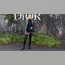 Anya Taylor Joy attended the Dior fashion show in a gray blazer, black pants with cutouts and a black turtleneck top.