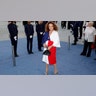 Diane von Furstenberg wore a white, blue and red dress to the red carpet at Vogue World red carpet, during Paris Fashion Week.