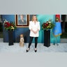 Kate Winslet wore a white suit jacket with black pants when walking the carpet at "The Regime" FYC panel event.