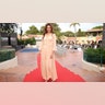 Katie Holmes wore a peach gown to the red carpet of the Filming Italy 2024