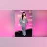 At the premiere of "Diane von Furstenberg - Woman In Charge," Katy Perry wore a form fitting denim corset and matching tight maxi-skirt, with cutouts throughout the sides.