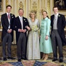 Prince William posing with his brother, father and step-mom on his dad's wedding day, in 2005.