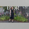 Minnie Driver arrived to the Dior fashion show in Scotland in a double breasted black dress, accessorized with a Miss Dior handbag.