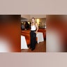 Olivia Wilde attended Michael Kors' new store, in an American Label white tank top and black trousers.