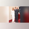 Pat Sajak and Vanna White posing at the Hollywood Walk of Fame
