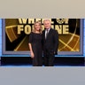 Pat Sajak and Vanna White in black outfits