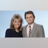 Pat Sajak and Vanna White posing for a promo pic