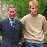 Prince William posing with King Charles III in 2000.