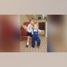 Prince William helped his baby brother as he took his first steps in 1985.