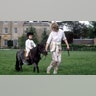 Prince William and Princess Diana going for a ride on a pony at Highgrove.