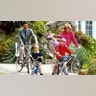 The royal family posed on their bikes while on a family trip to Tresco, Italy, in 1989.