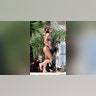 Sydney Sweeney walking back to her house in a bikini