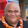 Actor Taylor Wily wears an orange lei at Hawaii Five-0 premiere.