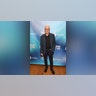Ted Danson attended the the Environmental Media Association IMPACT Summit in a black shirt with a blue jacket.