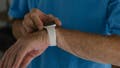 A man using his Apple Watch to locate his iPhone - Fox News