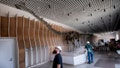 A 150 million year old dinosaur skeleton is displayed at the Natural History Museum's new welcome center as a construction crew works on July 2, 2024 in Los Angeles.